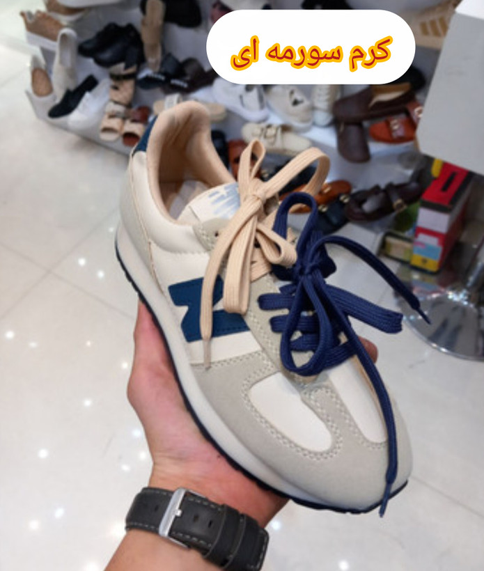 کتونی نیوبالانس مدل میانه رنگ آبی و صورتی دخترانه و زنانه ی تمام طبی دور دوخت